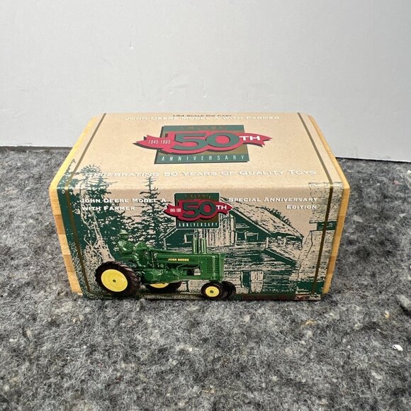 1/64 John Deere Model A Tractor With Man Ertl 50th Anniversary Commemorative - Picture 1 of 8